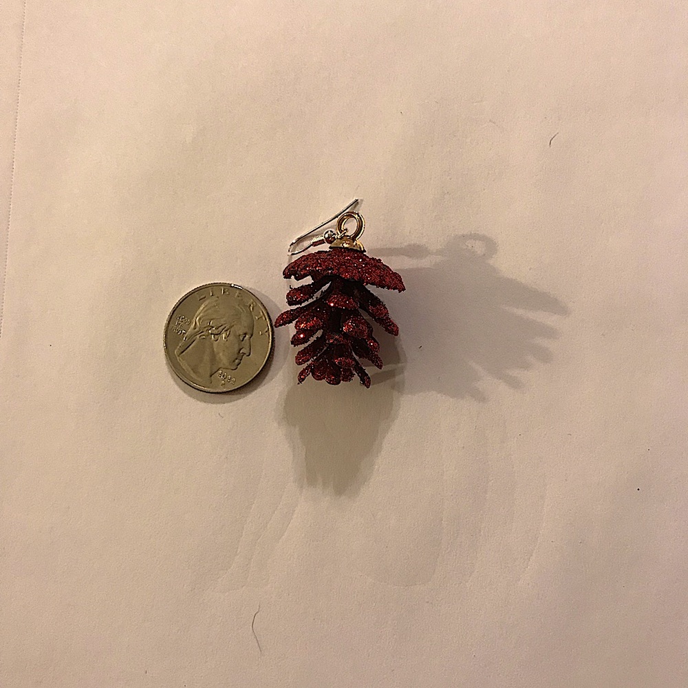Size compared to a quarter: Red mini pine cones Christmas earrings.